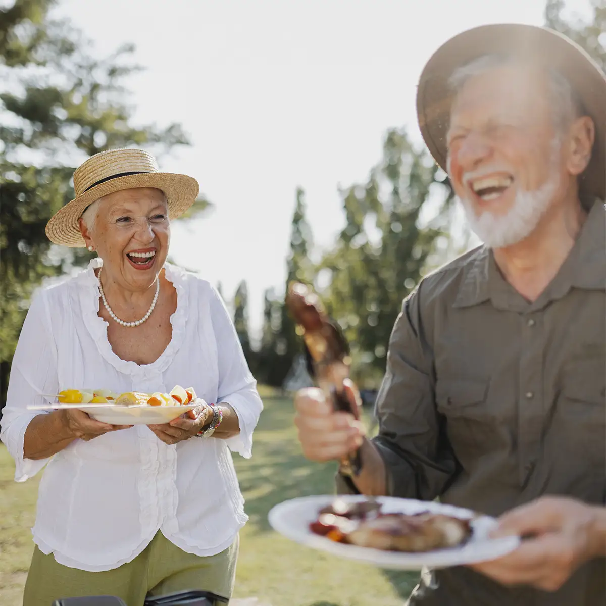 Senior couple smiling outdoors